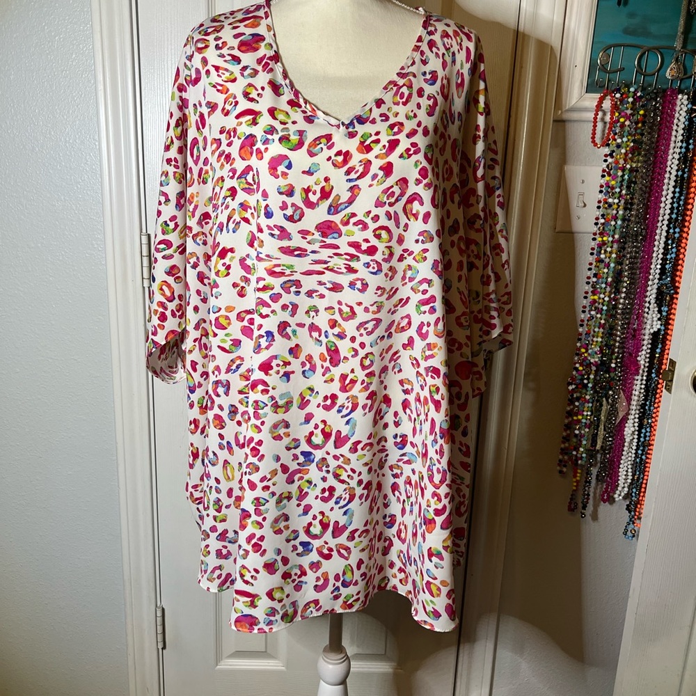 Bright cheetah print baggy shirt.